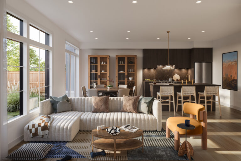 Sophisticated kitchen and cozy living area in the Clover townhome model